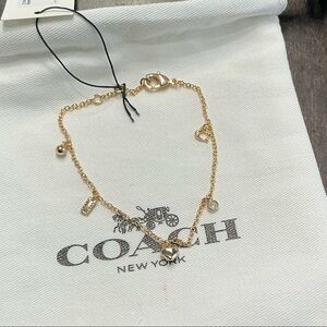 Coach Gold Charm Bracelet with Heart and Logo